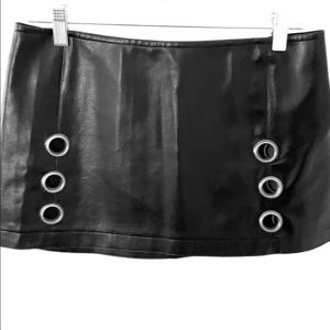 Miniskirt with grommets